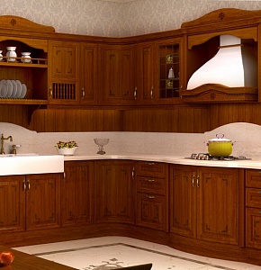 Кухня Magnolia - современные технологии в классическом дизайне. Фасады теплого янтарного цвета выполнены из массива акации, декорированные лазерной гравировкрй с изящным орнаментом.
